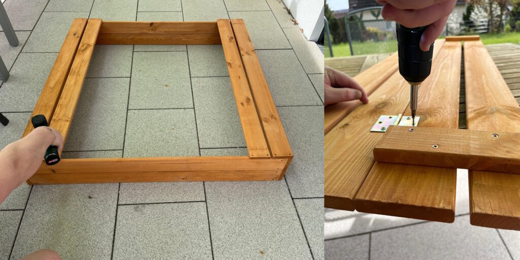 Das Foto zeigt, wie das Grundgerüst eines Sandkastens zusammen gebaut wird