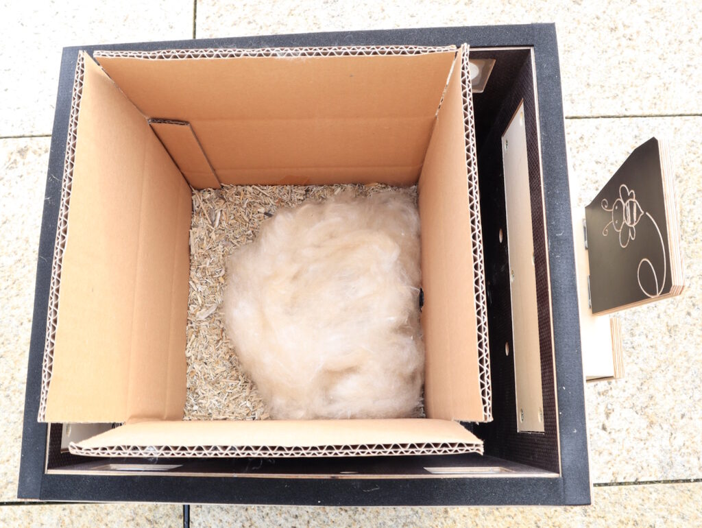 Das Foto zeigt ein Nest aus Kapok