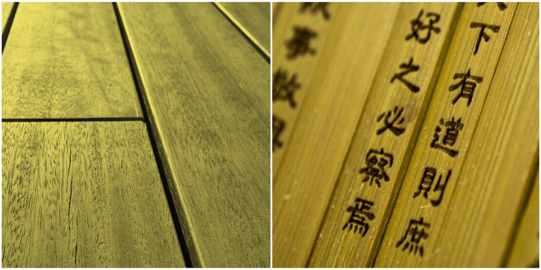 Das Foto zeigt einen Parkettboden und Chinesische Zeichen